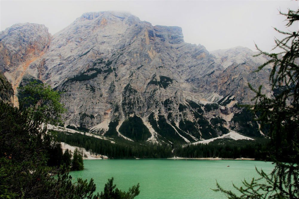 Similar – Image, Stock Photo Braies Lake with clouds in the Dolomites IV
