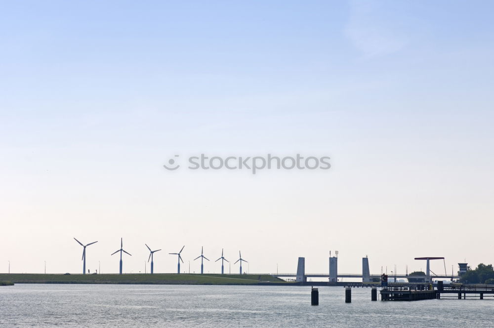 Similar – Image, Stock Photo Wind power plants in the morning haze