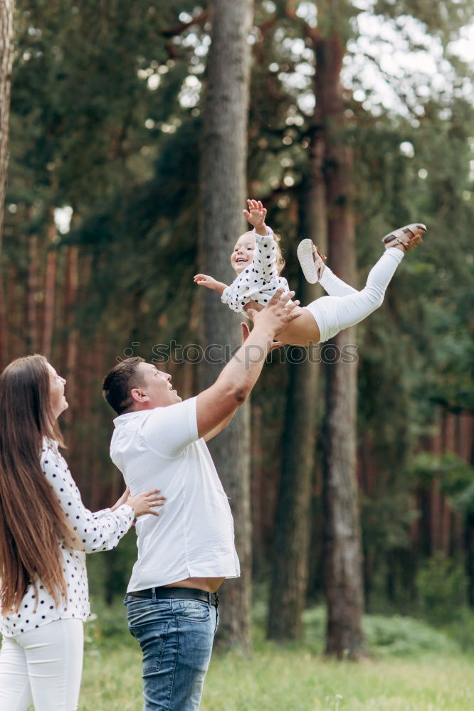 Similar – Image, Stock Photo happy family on a walk with a small child