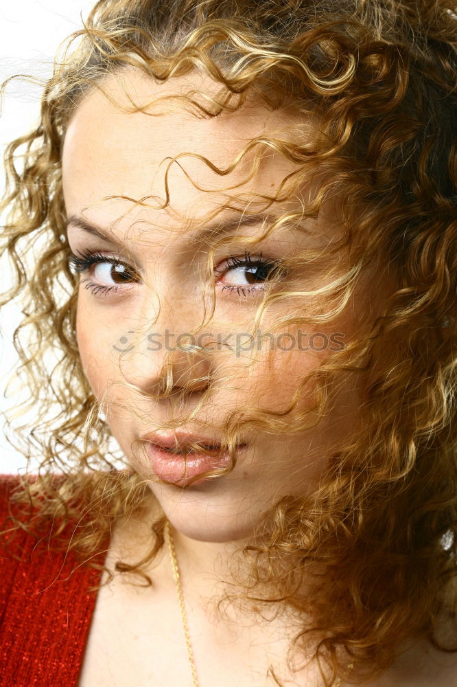 Similar – young woman with bun, forehead fringes and scarf