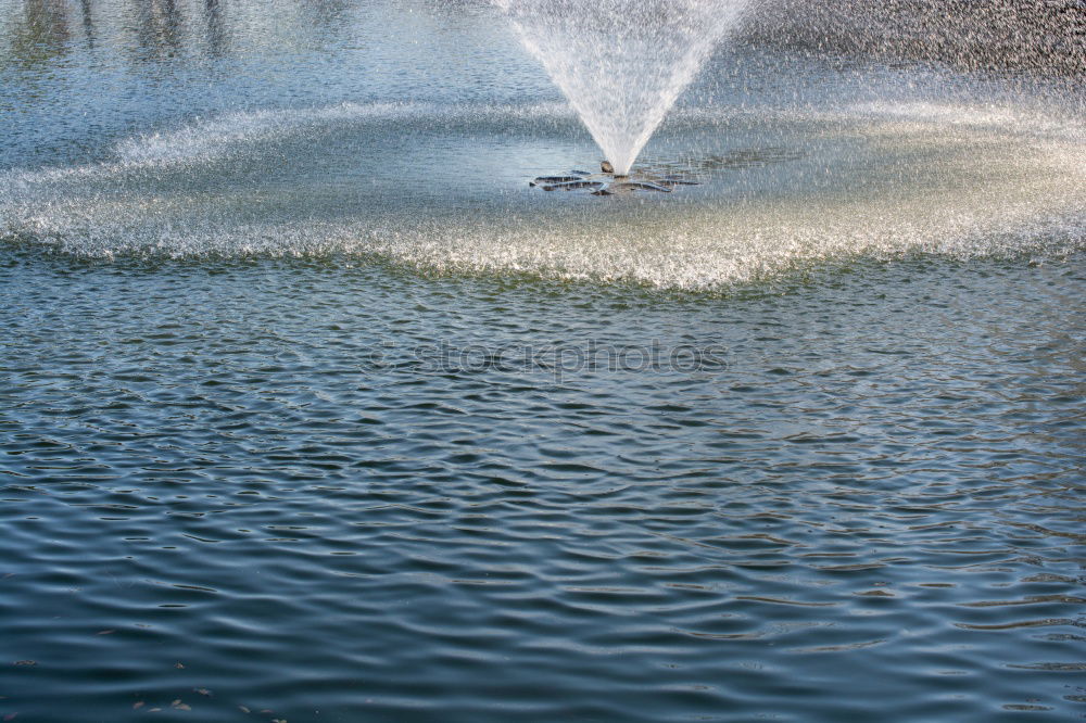 Similar – Wasserspiel Wassertropfen