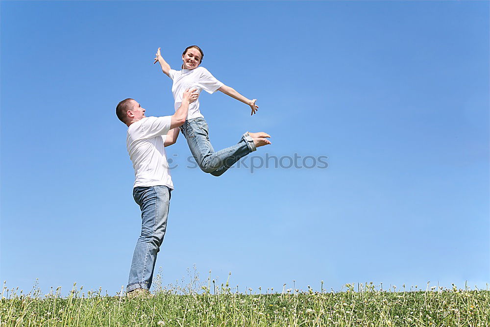 Similar – Image, Stock Photo Father and son playing on the beach at the day time. They are dressed in sailor’s vests. Concept of sailors on vacation and friendly family.