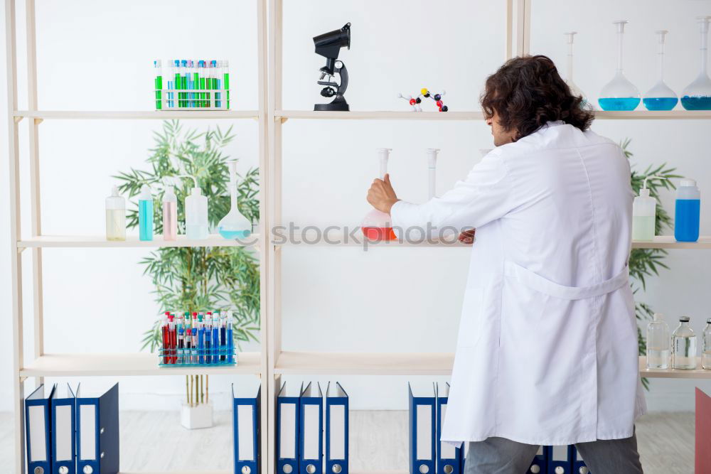 Similar – Image, Stock Photo Woman writing in laboratory