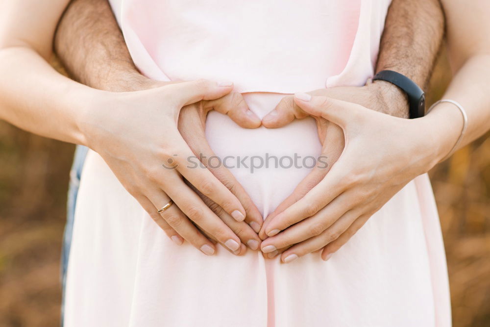 Similar – Image, Stock Photo Grandfather putting shoe to his grandson outdoors