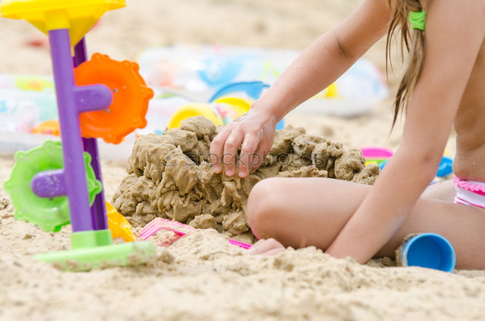 Similar – Image, Stock Photo Colourful toys in the sand