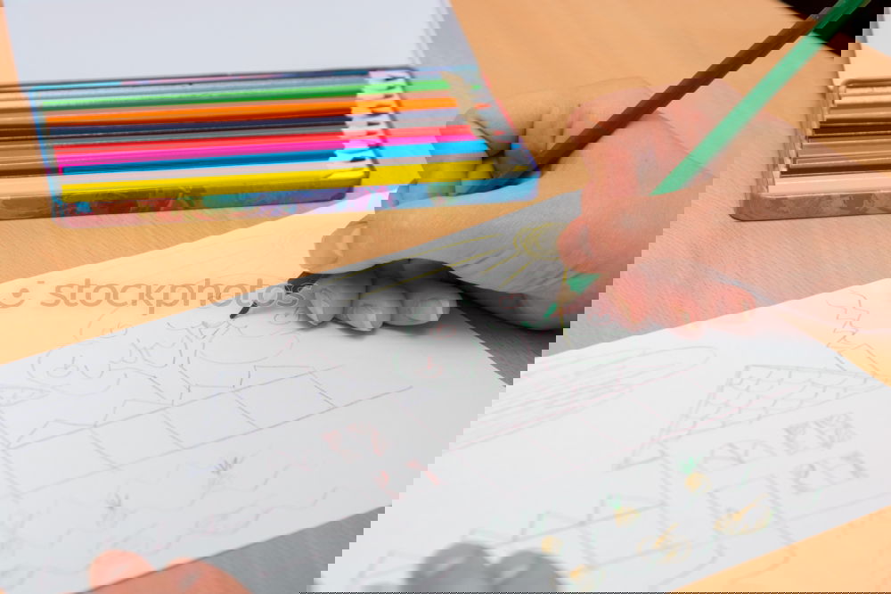 Similar – Image, Stock Photo Girl coloring a simple sketch of a skull