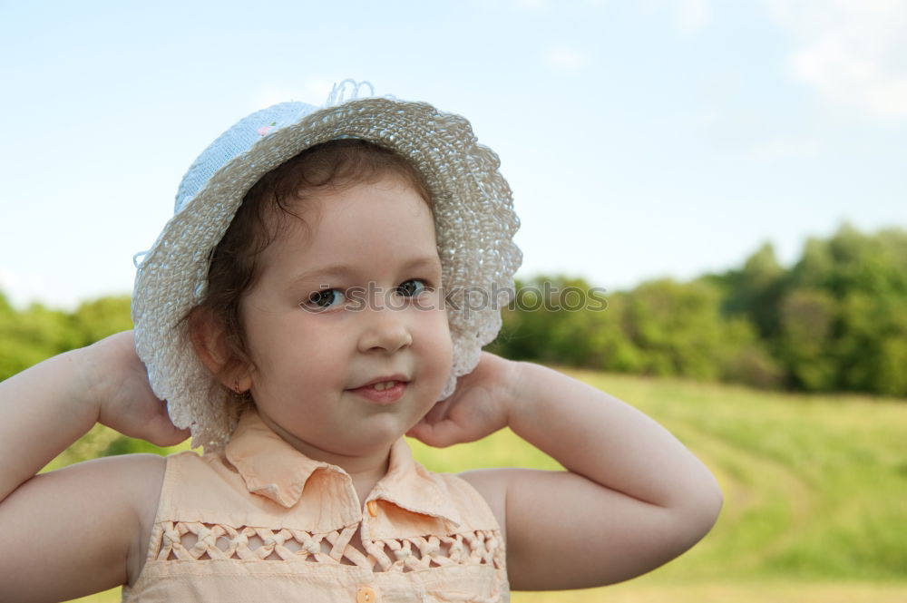 Similar – cute child with sun hat