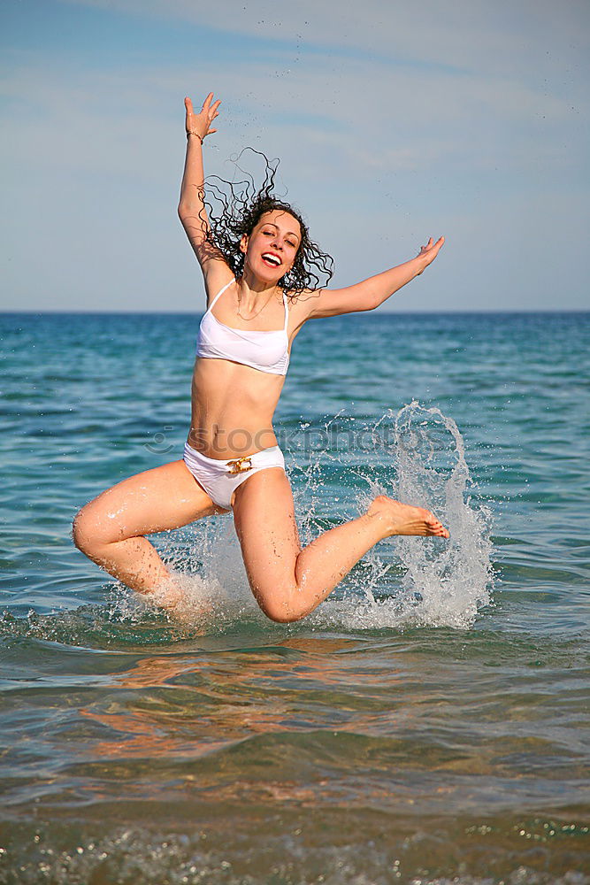 Similar – Stylish girl flying above ground