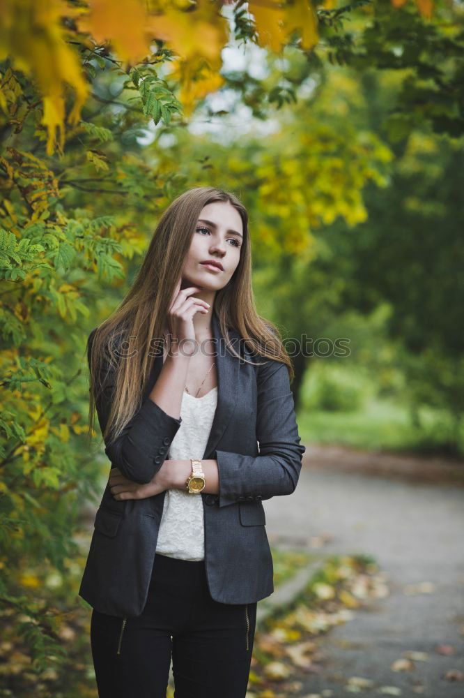 Similar – Image, Stock Photo Beautiful young woman, model of fashion, wearing black dress