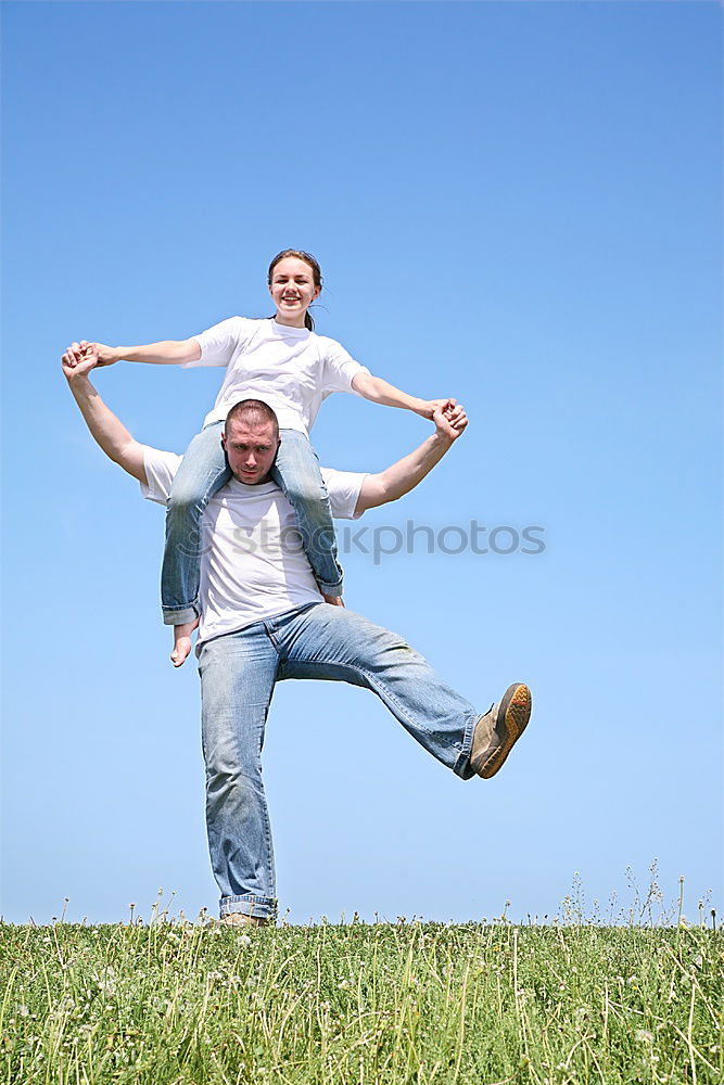 Similar – Image, Stock Photo Father and son playing on the beach at the day time. They are dressed in sailor’s vests. Concept of sailors on vacation and friendly family.