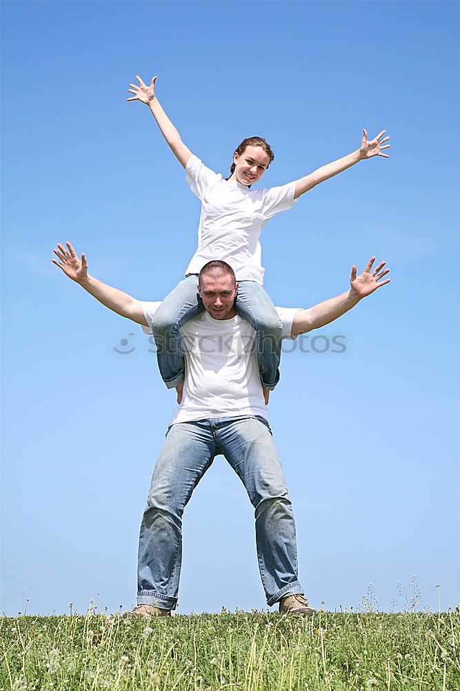 Similar – Image, Stock Photo Father and son playing on the beach at the day time. They are dressed in sailor’s vests. Concept of sailors on vacation and friendly family.