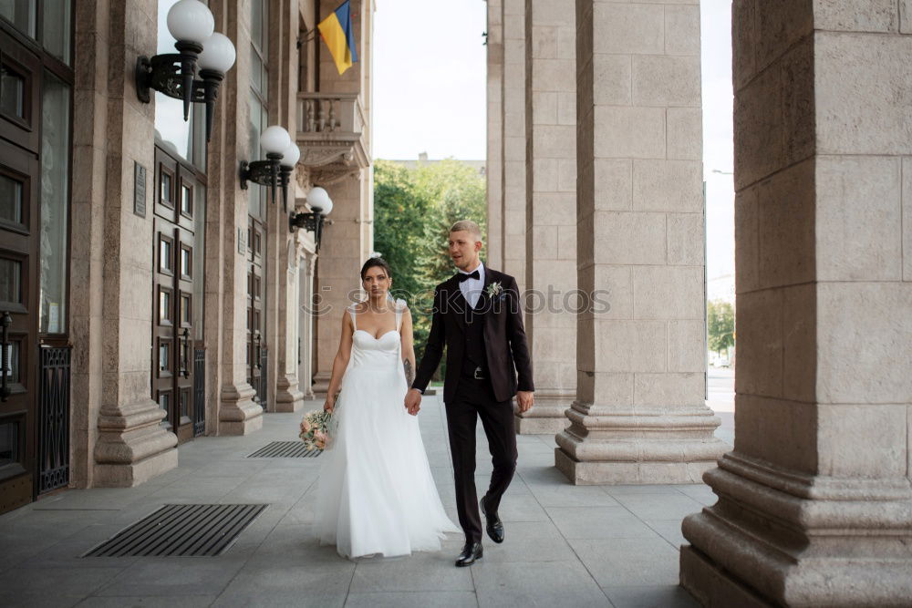 Similar – Newly married couple leaving the church.