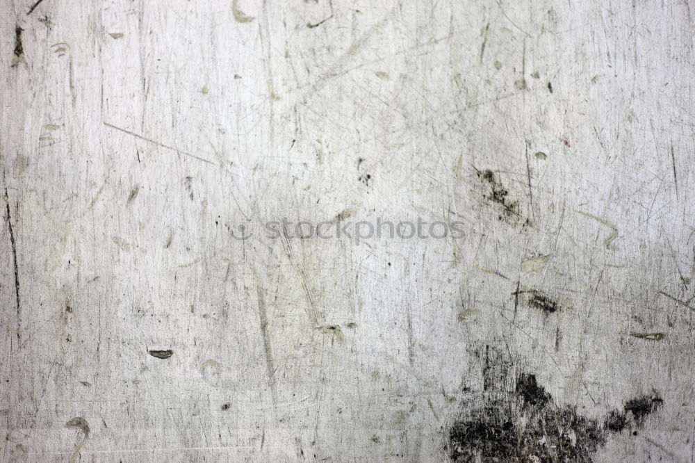 Similar – A piece of white adhesive tape over a crack in the plaster of a house wall