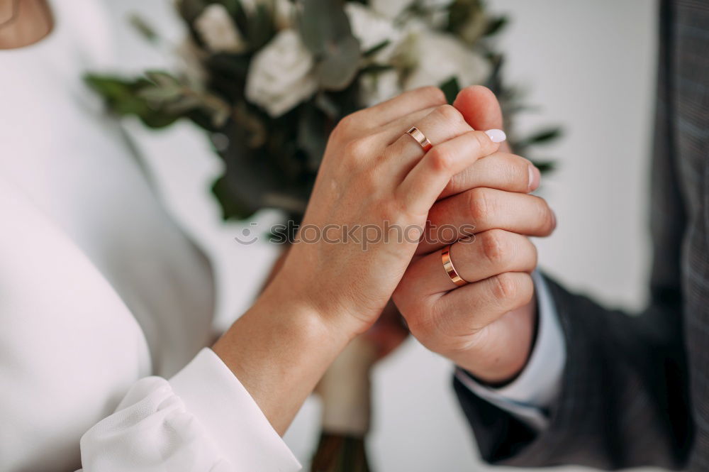 Similar – Image, Stock Photo Woman buttoning up man waistcoat