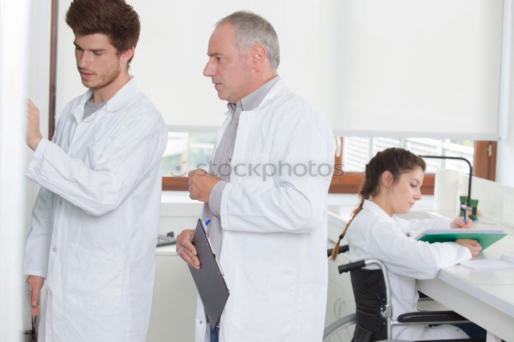 Similar – Image, Stock Photo People co-working in lab