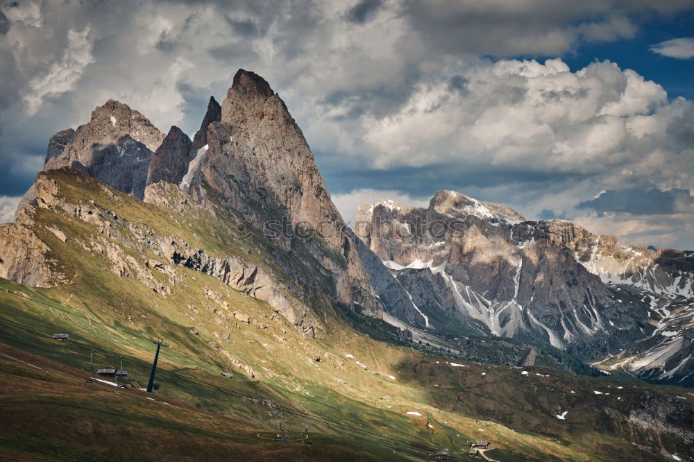 Similar – There’s a cow in front of the mountain.