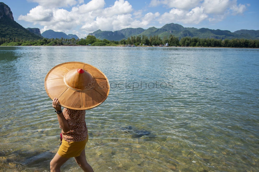 Similar – Image, Stock Photo A sun hat is an advantage