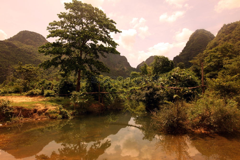 Similar – Image, Stock Photo Landscape Vietnam. River view in the dim light of dusk at Ninhbinh, Tam Coc, Vietnam