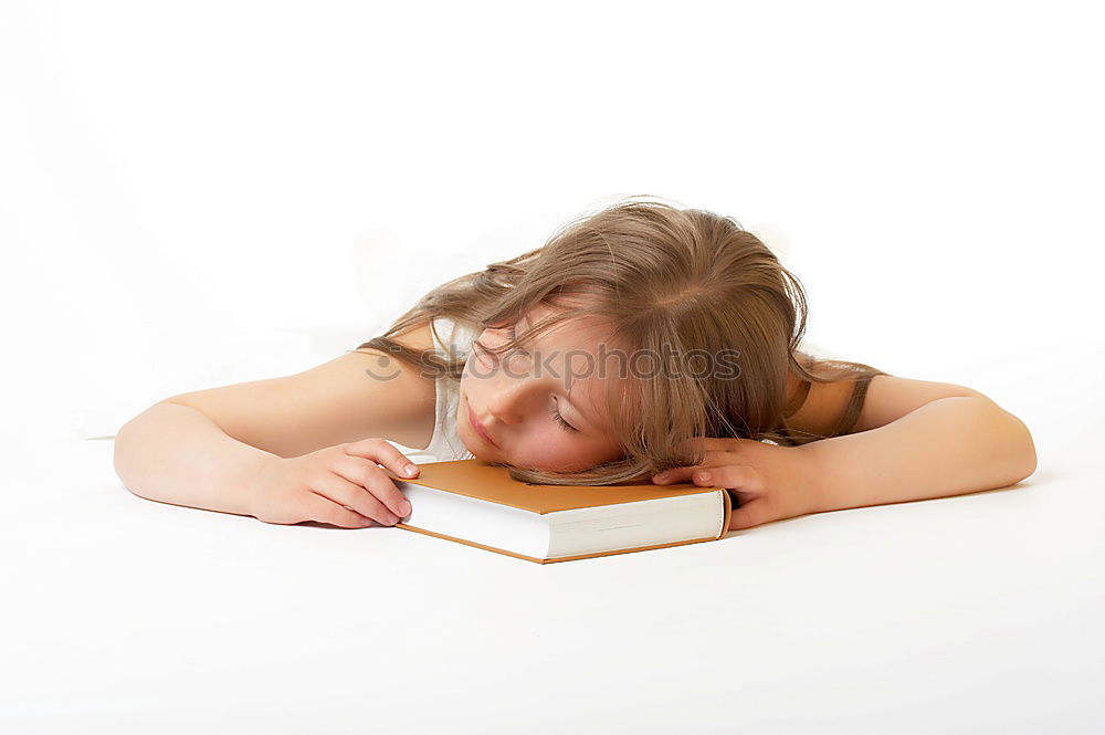 Image, Stock Photo Schoolgirl reading a book in classroom