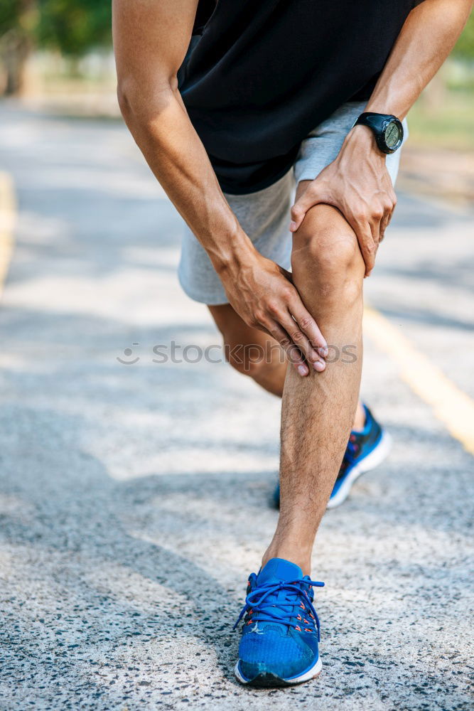 Similar – Sportsman looking a smartwatch