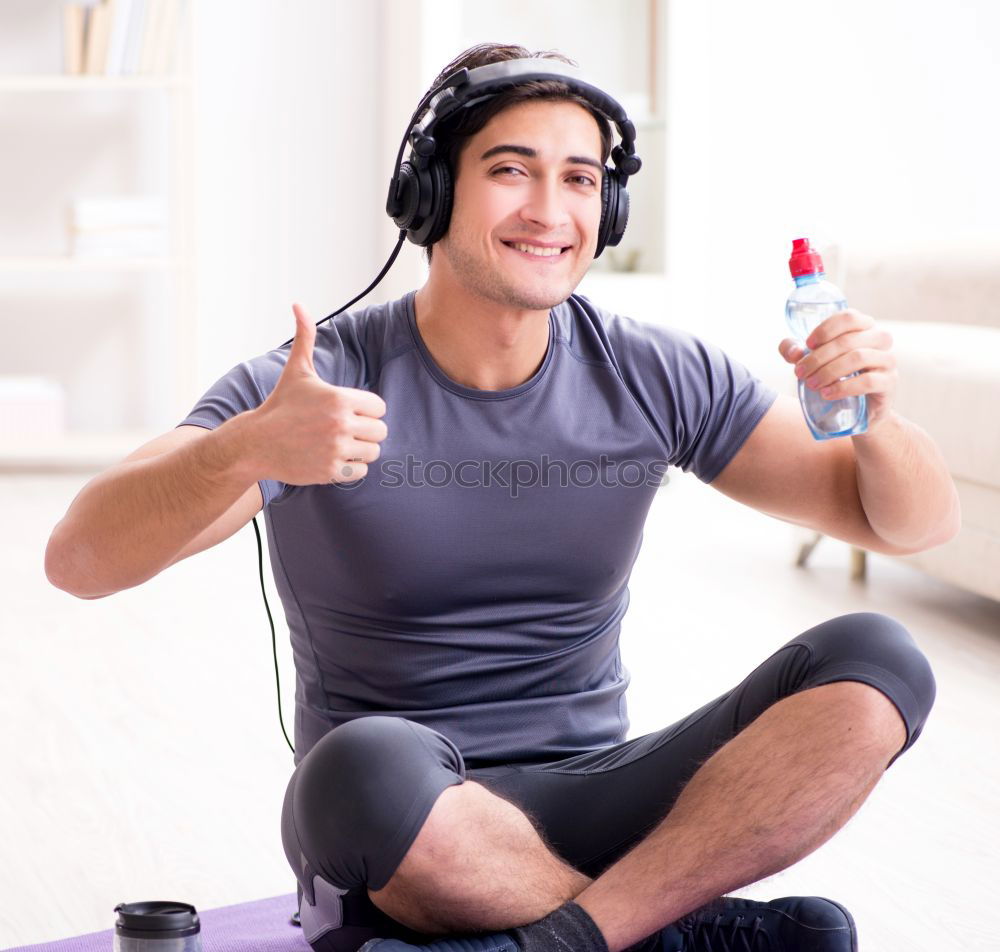 Similar – Portrait of relaxed young boy sitting at the patio door and listening to music from mobile phone