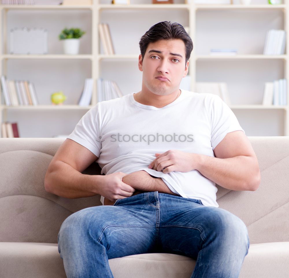 Similar – Image, Stock Photo Portrait of a young thoughtful mixed race man sitting in the sofa