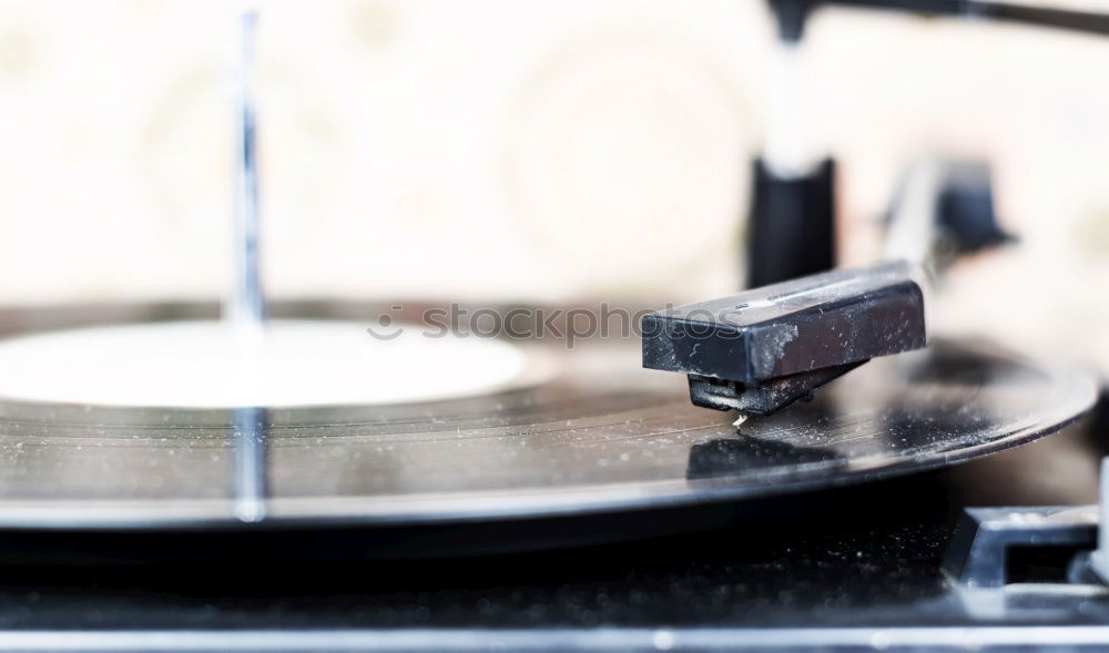 Similar – vintage music player turntable with lp