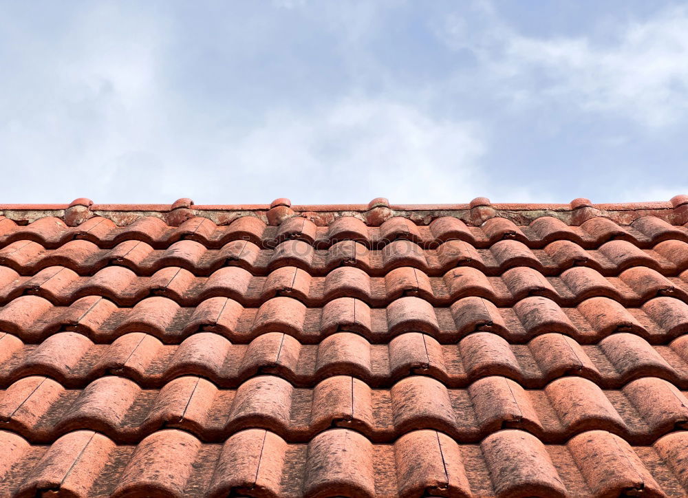 Similar – Old roof tiles on house wall