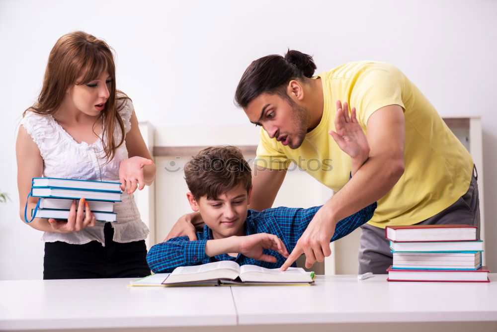 Similar – Image, Stock Photo Teenagers sitting by a blackboard at school