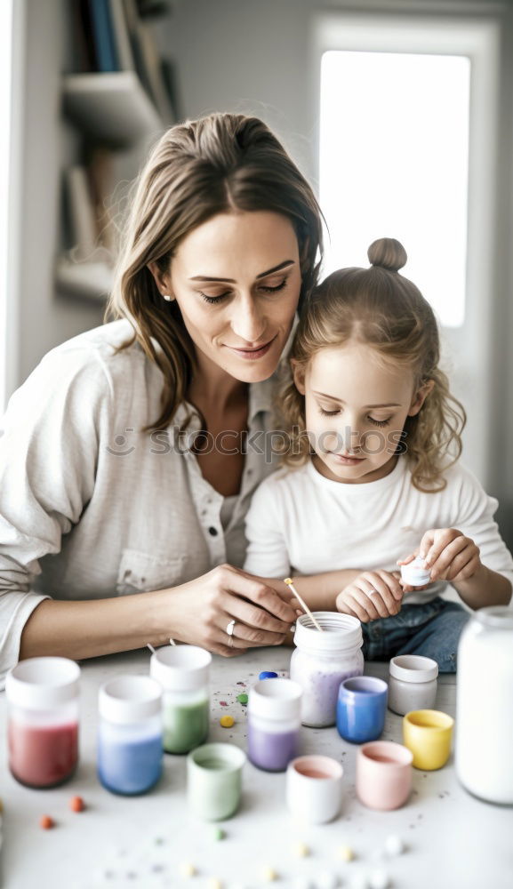 Similar – Image, Stock Photo Woman assembling furniture at home with Daughter