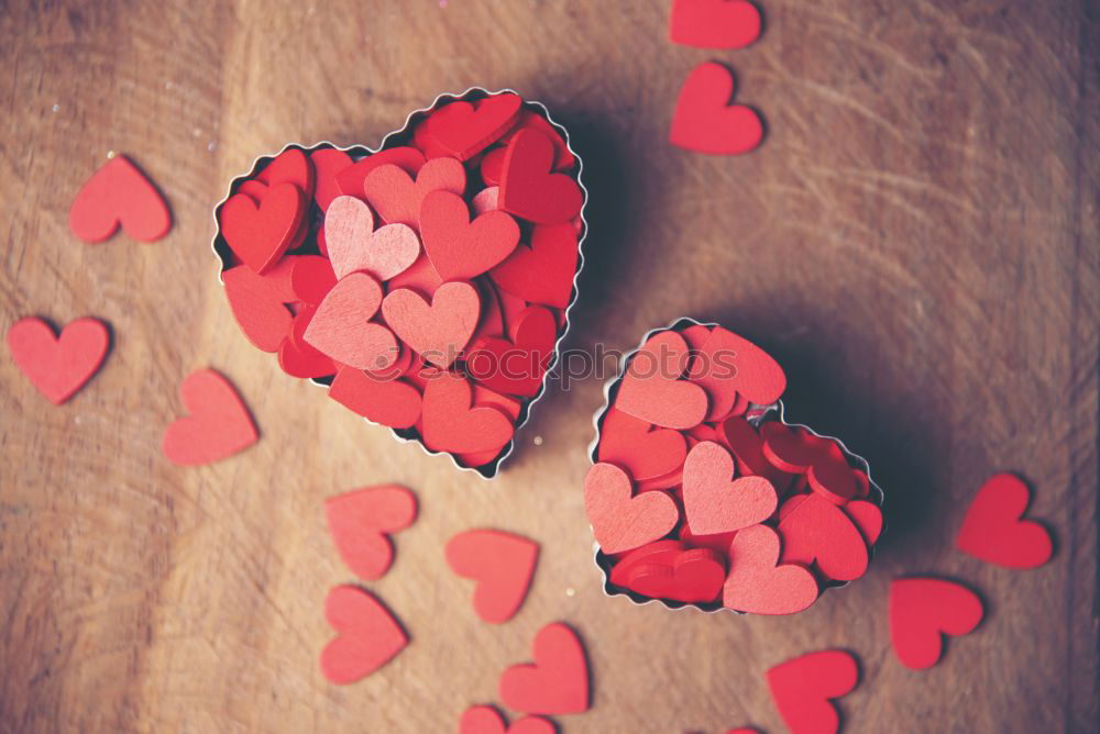 Similar – Image, Stock Photo Heart made of red roses on wooden table for Valentine’s Day.