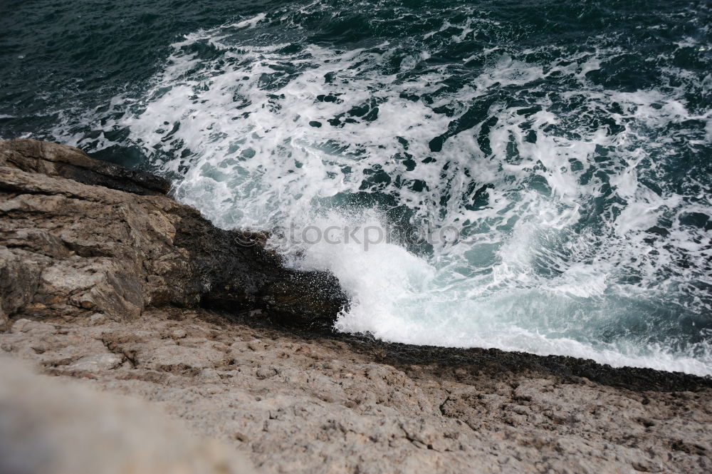 Rock in the surf