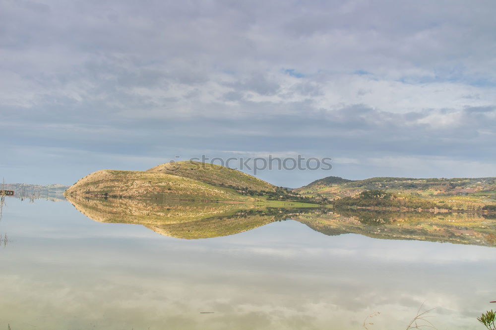 Lake in sunny mountains