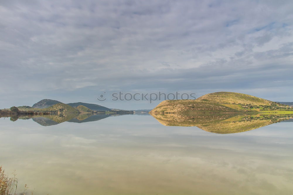 Similar – Lake in sunny mountains