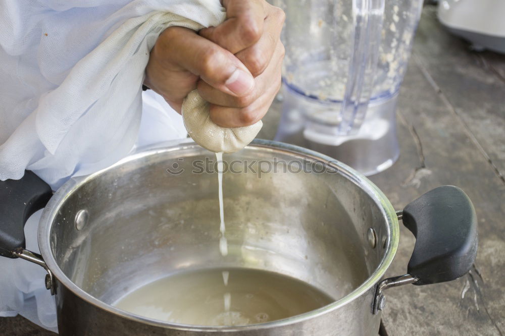 Similar – Image, Stock Photo woman hands sprinkling white flour over croissants