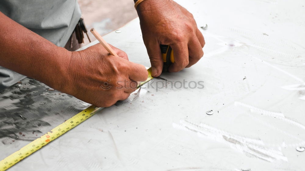 Similar – Carving stone, craftsman shaping stone