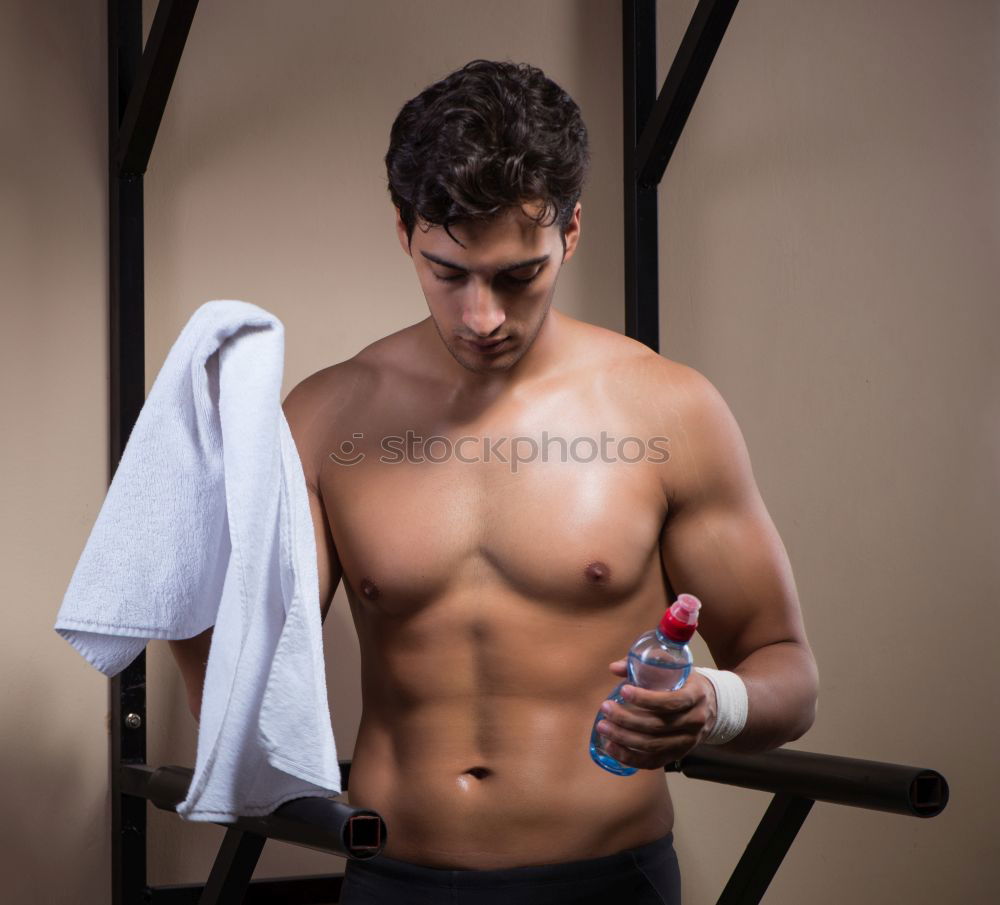 Similar – Man wrapping hands with bandages before boxing training