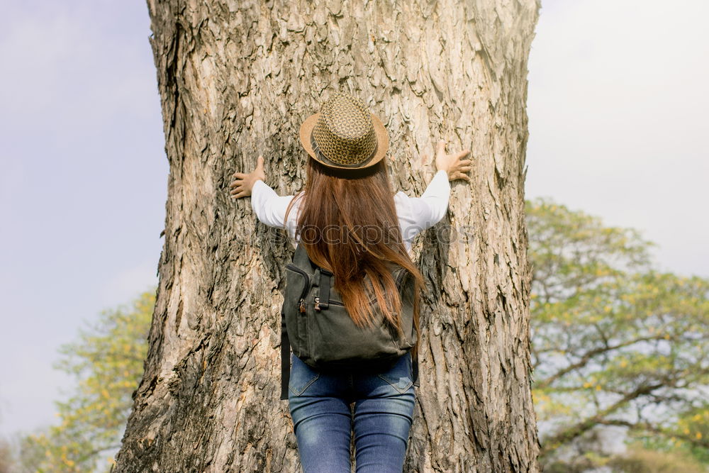 Similar – Sitting underneath a tree