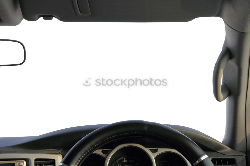 Similar – Image, Stock Photo Sunny car ride. View through the windshield onto the highway. Eyes and glasses of the driver as reflection in the rear view mirror.