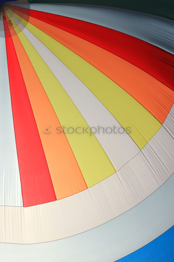 Similar – Colour cardboard in rainbow colours | colour combination