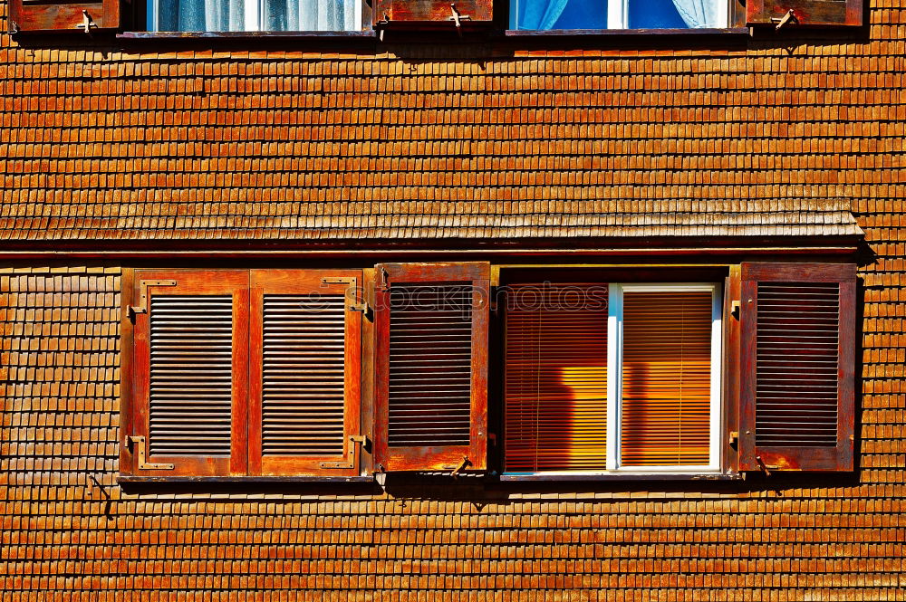 Similar – facade with rounding, plaster and brick