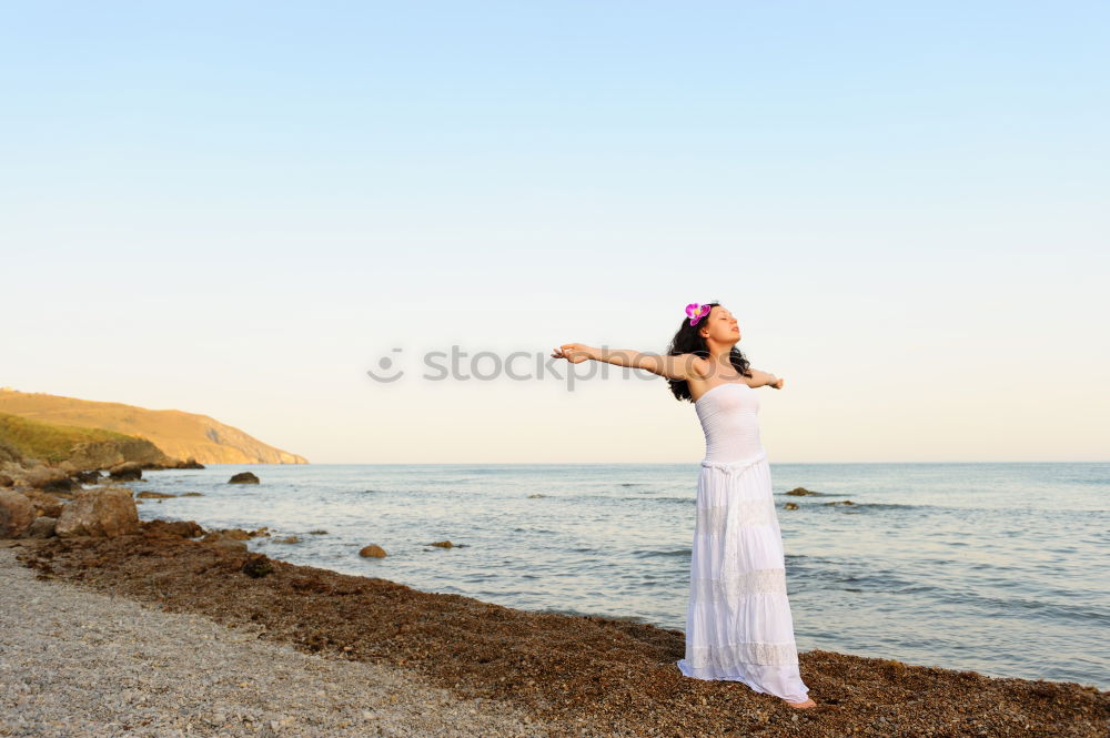 Similar – Little girl feeling free on the beach