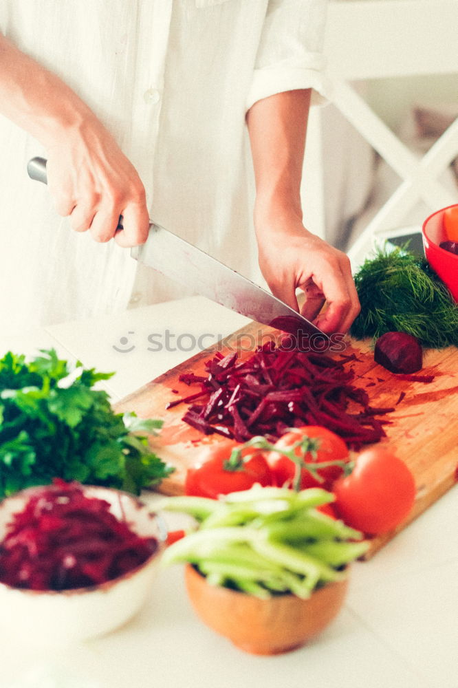 Similar – Two female hands holding a dried red hot pepper