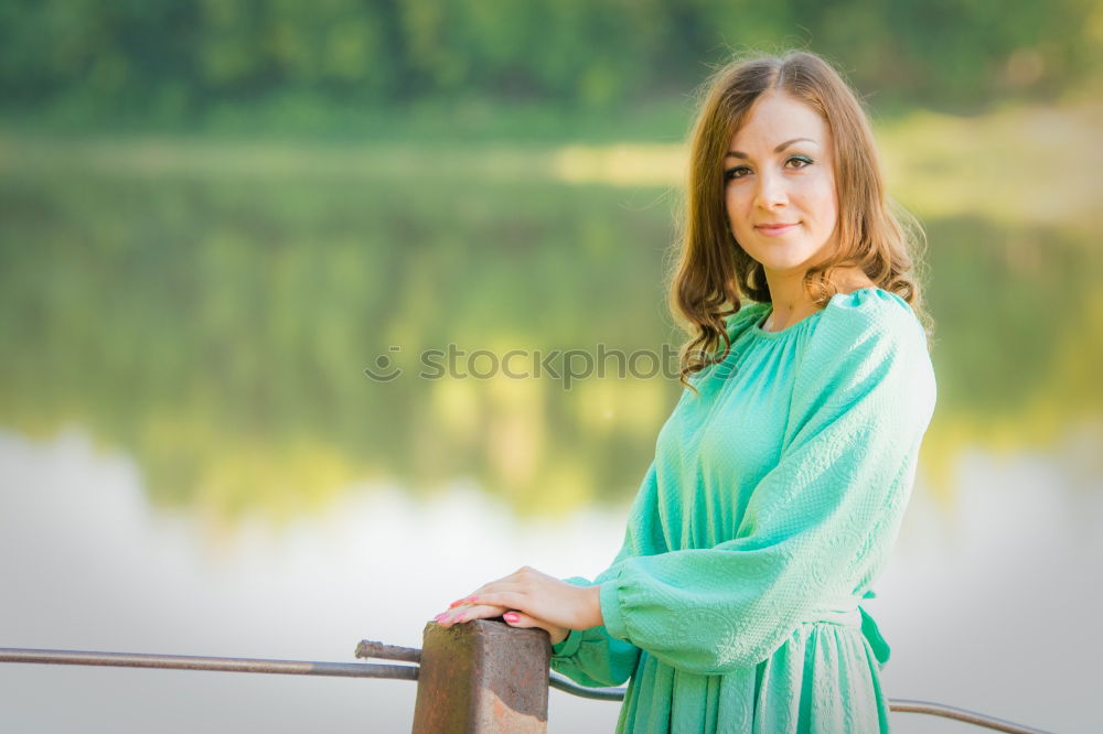 Similar – Image, Stock Photo Cheerful blond mature woman in park