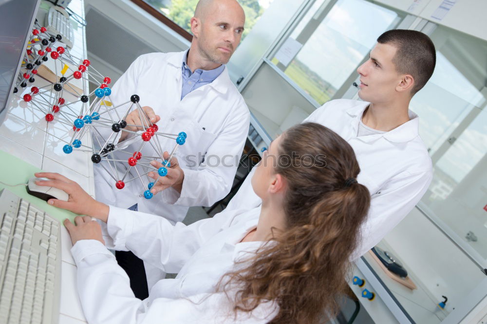 Similar – Image, Stock Photo Women standing and working in lab