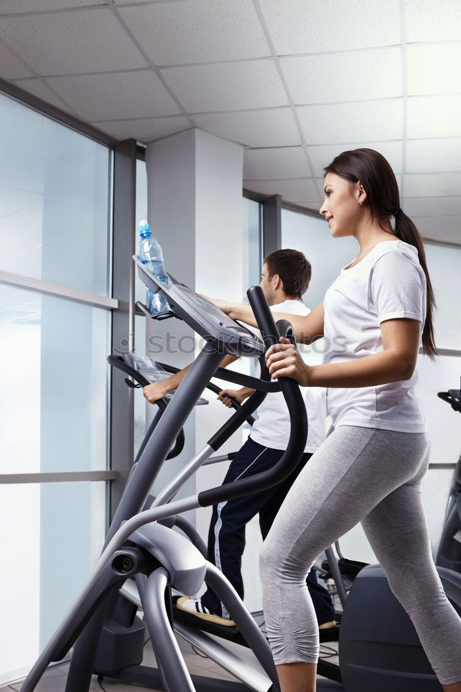 Similar – Image, Stock Photo People running over treadmill in a training session