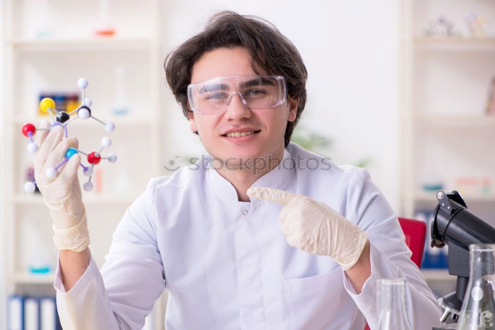 Similar – Image, Stock Photo Young man in lab