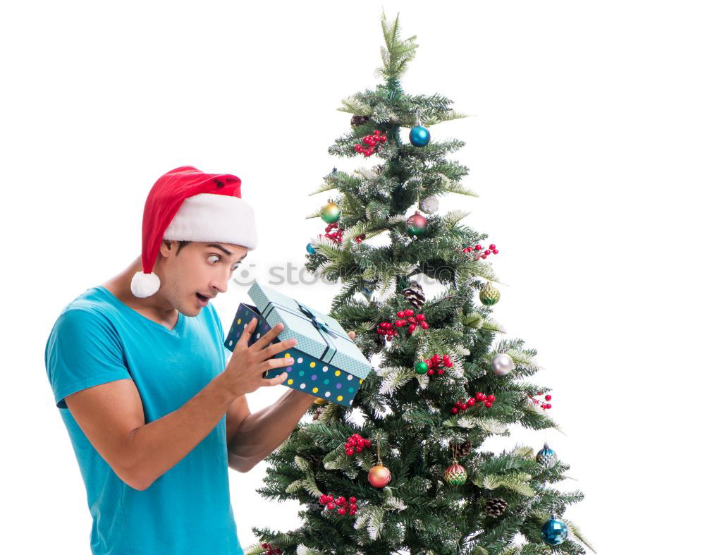 Similar – Image, Stock Photo Young girl decorating Christmas tree with lights at home