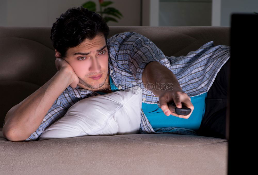 Similar – Cheerful woman lying with book