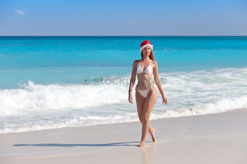 Image, Stock Photo Rear view of sexy young caucasian woman sunbathing topless on romote pabble beach on Pag island, Croatia, Mediterranean.